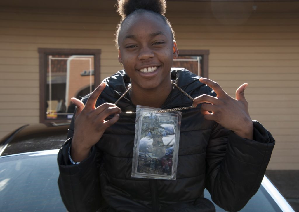 Jhjh Pina, 16, protests outside a Taco Bell in Vallejo, California, where police fatally shot her uncle, 20-year-old rapper Willie McCoy, on Feb. 9.