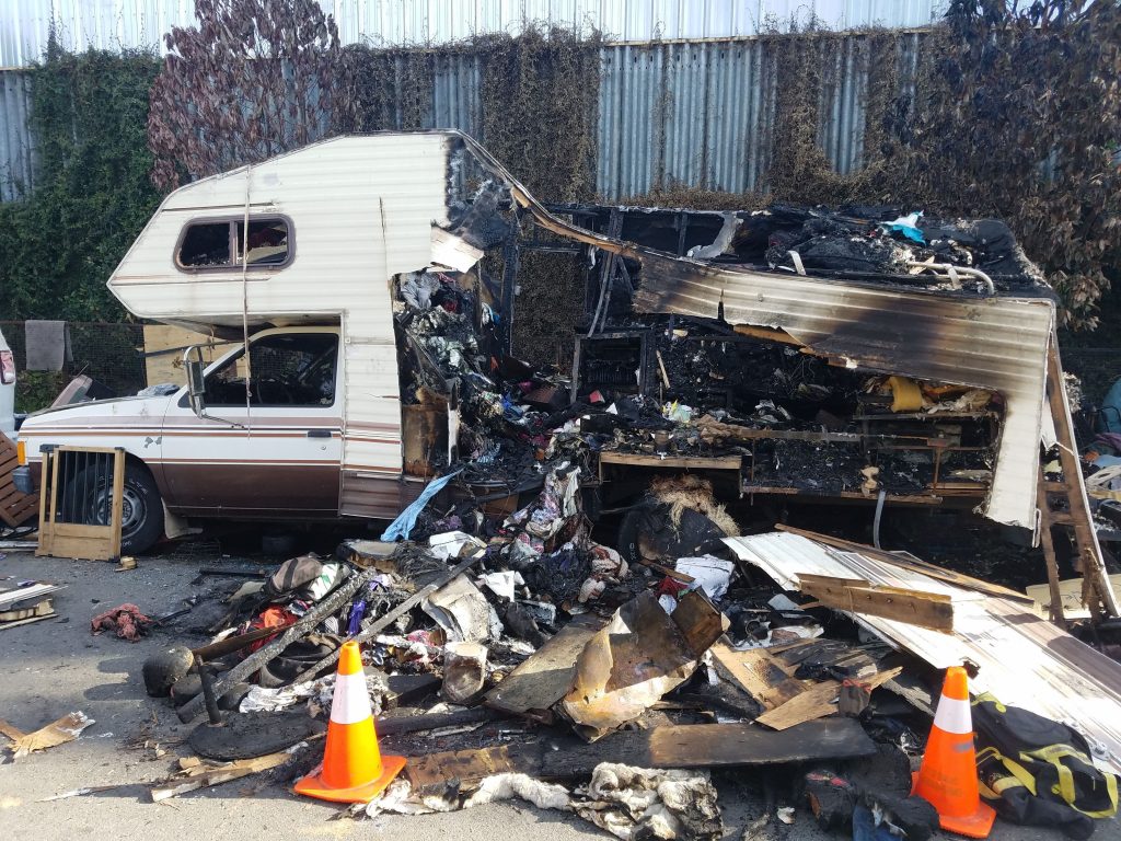 One of two burned RVs still on Union Street as of Aug. 6, 2019. Photo by Dave Id.